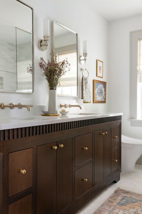 Twin Cities bathroom renovation with dark oak custom beveled vanity and mixed metals. Dark Wood Stain Bathroom Vanity, Dark Stain Bathroom Vanity, Alder Wood Cabinets, Jkath Design, Master Vanity, Dark Wood Bathroom, Custom Bathroom Vanity, Newly Remodeled Kitchens, Floor Heating Systems