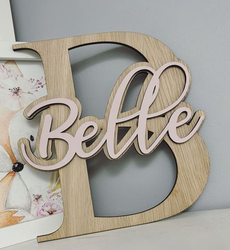 Here we have our lovely Oak veneer Letter with the name Belle Please note this is a ready to post item and cannot be changed  20cm Letter  Belle  Oak venner Backing Pink Letter  We have lots and lots of ready to post items which can be posted next working day Door Signs Wooden, Wall Statement Piece, Letter Inspiration, Wall Statement, Childrens Bedroom Decor, Initial Wall, Laser Cut Wood Crafts, Pink Letter, Children's Bedroom