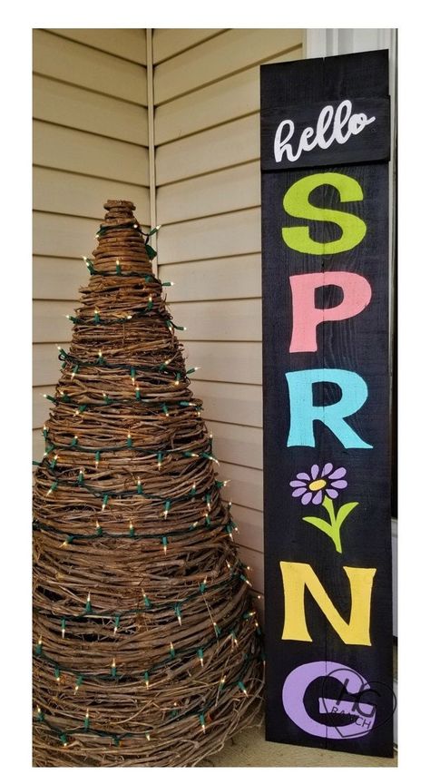 "Hello SPRING ~ This colorful and rustic porch sign will be the focal point of any porch! This premium cedar wood sign is first stained then painted a distressed Black with 'hello SPRING' hand painted in fresh Spring colors with the \"I\" in SPRING replaced with a colorful flower. The sign is lightly distressed then sealed for outdoor preservation. Approximate size: 60\" tall by 11\" wide PLEASE NOTE: Our pieces are made of wood which comes with knots, dings, small chips, holes, splits, and impe All Season Porch, Holiday Boards, Summer Wood Sign, Summer Porch Signs, Porch Leaners, Plank Art, Spring Porch Decor, Rustic Porch, Auction Ideas