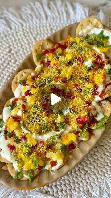 Pranomm on Instagram: "The perfect summer snack thats Quick & Easy, plus so DELICIOUS !   🍋‍🟩🥭Chatpati Mango Papdi Chaat   Ingredients  For the Desi Mango Salsa  1/2 diced Mango  1 chopped green chilli  Juice of 1 lemon  2 tbsp pomegranate  1 tbsp chopped fresh coriander  1/4 chopped sweet yellow pepper 1/4 chopped sweet red pepper  Salt to taste   For Assembling  Around 12-17  papdi /crackers  1/2 cup Whisked curd ( add 1/2 tsp salt, 1/2 tsp jeera powder in it )  1- 1.5 tbsp Saunt (sweet & tangy imili chutney)  1 tbsp green chutney (mint & coriander chutney)  1/4 cup boiled diced potato  1/4 cup sev  Fresh coriander to garnish   Method  In a bowl add all the ingredients for the desired mango salsa & give it a good mix.   Now for assembling our dish, first take a nice platter spread the Papri Chaat Presentation, Chaat Platter, Dahi Papdi Chaat Recipe, Papdi Chaat Recipe, Coriander Chutney, Papdi Chaat, Chaat Recipe, Vegetarian Snacks Recipes, Green Chutney