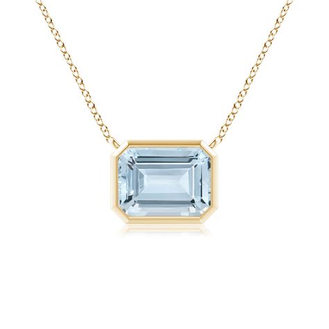 This classic east west aquamarine pendant is crafted in 14k yellow gold. The emerald cut pastel-blue gemstone is mounted in a horizontal bezel setting. Stone Jewellery Designs, Aquamarine Pendant, Aquamarine Necklace, Aquamarine Jewelry, Aquamarine Stone, Blue Gems, Yellow Gold Pendants, Crystal Necklace Pendant, Blue Gemstones