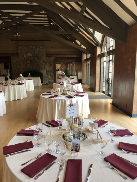 Ivory table linens and burgundy napkins Ruby Table Decorations, Burgandy Wedding Napkins, Burgundy Table Runner Wedding, Burgundy Napkins Wedding, Burgundy Wedding Theme Table Settings, Burgundy Table Setting Wedding, Catering Checklist, Ivory And Burgundy Wedding, Champagne And Burgundy Wedding