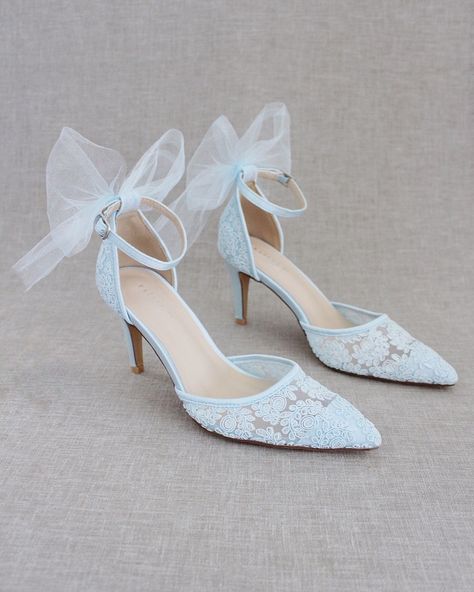 "Crochet style pointy toe heels with detachable ankle strap and added tulle bow for sweeter accent. Perfect wear as bridal shoes, bridesmaids, mother of the bride, bridal shower, romantic dining, or any of your special events. DETAILS: HEELS: 3 inches COLORS AVAILABLE: Dusty Pink, Light Blue, Ivory, and White UPPER: Synthetic upper and lining MATERIALS: Manmade outsole ORIGIN: Imported STYLE NAME: EVA Not sure of which size to purchase? Shoes measurements are as follow: (Please note measurements Blue Butterfly Heels, Shower Romantic, Light Blue Crochet, Light Blue Heels, Shoes Editorial, Tulle Bow, Flower Girl Shoes, Bridal Flats, Prom 2024