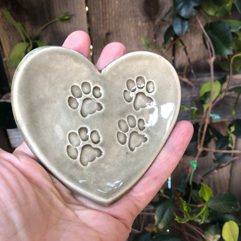 heart shaped paw prints jewelry dish, vanity table night stand ring dish, gray paw prints heart dish, teabag holder tealight candle dish Diy Jewelry Holder Clay, Teabag Holder, Candle Dish, Paw Print Jewelry, Heart Dish, Diy Jewelry Holder, Paw Print Design, Pottery Gifts, Hand Built Pottery