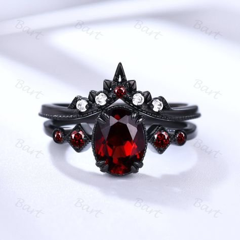 Rhodium Black Gold Oval Garnet Ring, Punky Style Black Ring,Five Stone Garnet Engagement Ring, Black and Red Promise Ring January Birthstone ★ Product Specifications 1. Oval Garnet & Four garnet Side Stone Engagement Ring: Metal Type: 14K Black Gold Center Stone: 6*8mm Oval Natural Garnet Side Stone: Round cut Natural Garnet 8-Prongs pave set Same style ring set: https://www.etsy.com/listing/1614839322/black-gold-alexandrite-ring-set-color With Alexandrite: https://www.etsy.com/listing/162902687 Black And Red Wedding Rings Women, Black Ring With Red Stone, Black And Red Rings Engagement, Halloween Engagement Ring, Persephone Engagement Ring, Black And Red Ring, Black And Red Engagement Ring, Red And Black Engagement Rings, Goth Wedding Ring Victorian Gothic