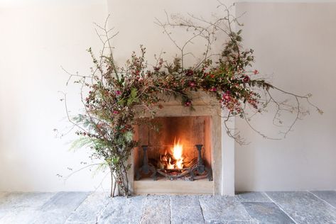 Holiday Decorating Trend: Sculptural Garlands :: This Is Glamorous Mantel Flowers, Winter Mantels, Floral Archway, Mantel Design, Christmas Shoot, Festive Wreath, Holiday Garlands, Christmas Mantle, Christmas Fireplace