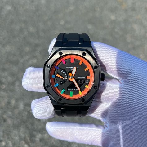 100% Hand Assembled In Delaware 100% Original G-Shock W/ Receipt And Hang Tag From Casio. Black Silicone Strap Black 100% Stainless Steel Case Custom Glow In The Dark Orange Hands Custom Orange Hour Ring Chrome Pushers Custom Rainbow Hour Marker (Hour Marker Can Be Swapped To Orange To Match Ring Before Shipping) @Moissanitemarket On Instagram Ga-2100 Gshock G-Shock G Shock Casio Casioak Royal Oak Rolex Patek Audemars Piguet Casi-Oak Orange Hour, Seiko Coutura, Match Ring, Rolex Men, Cartier Watch, Mechanical Design, Dark Orange, Royal Oak, G Shock