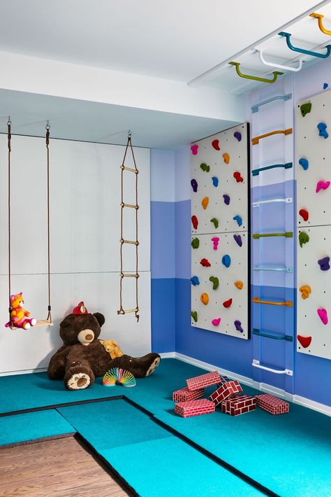 These Playroom Ideas Will Make You Want to Be a Kid Again Fun Playroom Ideas, Fun Playroom, Color Block Wall, Den Library, Home Climbing Wall, Contemporary Basement, Indoor Playroom, Restoration Hardware Baby, Stuffed Teddy Bear