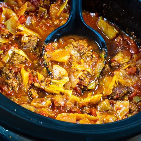 Slow Cooker Spicy Cabbage Beef Soup is full of browned ground beef, onion, cabbage and tomatoes. It's a simple soup, but with so much flavor.