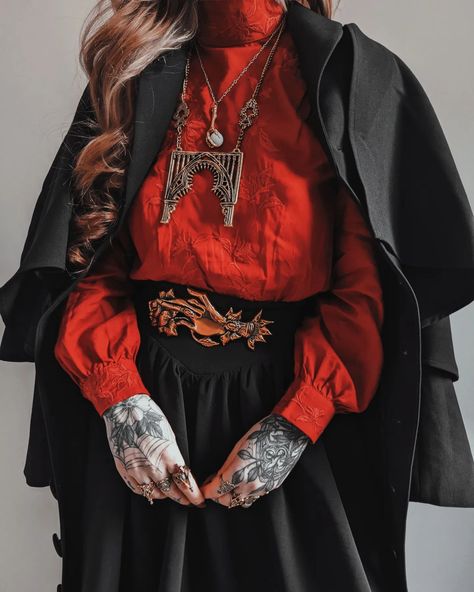 When @livelyghosts and @petalsandpoison are just a match made in heaven 🙏🌹 I love how beautifully all of these pieces go together. This blouse is one of my favourites and I'm so glad they released a red version as you all know how much I love my hint of red ♥️ Wearing the Vlad Blouse Dracula Skirt Full length Nevermore Cape Coat Spirescape, Sacred Arches, Cathedral Solace rings 🎃KLLSYM for 10% off @livelyghosts Lucerna Mourning Hand Belt Lenore's Tomb Curio Ring Allerdale Arche Neckla... Cathedral Outfit, Cathedral Fashion, Corp Goth, Gothic Fashion Victorian, Red Goth, Ethereal Elegance, Red Gothic, Dnd Stuff, Oc Inspo