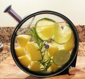 Lime, Pineapple, and Rosemary Infused Tequila  Read more at: http://puttingsomethingby.com/2013/10/01/lime-pineapple-rosemary-infused-tequila/#more-242 | Putting Something By Porthole Infuser Recipes, Tequila Infusions, Infused Tequila, Infused Liquors, Tequila Recipe, Cocktail Ideas, Glass Drink, Cocktail Photography, Evening Look