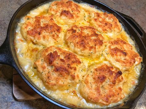 A cast-iron skillet filled with creamy seafood pot pie topped with golden-brown cheddar biscuits, fresh from the oven. Cajun Seafood Pot Pie, Stovetop Recipes, Seafood Pot Pie, Seafood Pot, Creamy Seafood, Seafood Dinners, Cozy Dinners, Cat Rock, Cajun Seafood