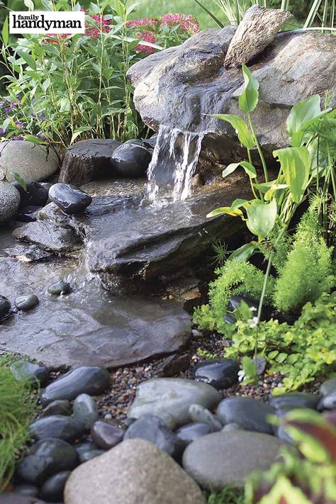 20 Cheap Landscaping Fixes That Look Expensive Water Falls Garden Wall Fountains, Rockery Water Feature, Stone Fountains Outdoor, Bucket Pond, Toad Habitat, Terrace Fountain, Water Fountain Ideas, Rainforest Garden, Backyard Water Fountains