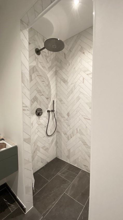 Marble glorious white herringbone Shower Remodel Herringbone, Large Marble Herringbone Floor, Master Bath Tile Shower Ideas Herringbone, Herringbone Tile Shower Wall, Herringbone Bathroom Wall, Bathroom Herringbone Tile, Octagon Tile Bathroom, Herringbone Shower Wall, Herringbone Shower Floor