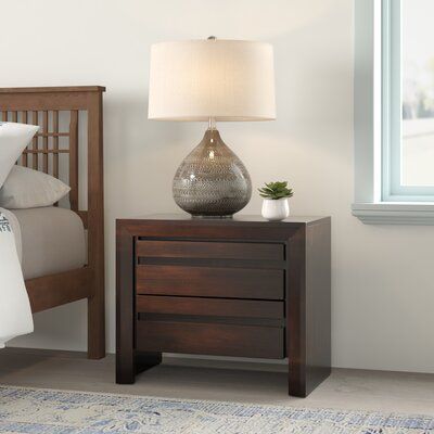 Bring sleek style and storage to your bedside with this 2-drawer nightstand. A great way to introduce contemporary design into your ensemble, it showcases a clean-lined frame crafted from wood. The two drawers provide ample space to tuck away nighttime essentials, and each one has a carved pull that runs the length of the drawer for easy operation. The chocolate brown finish features tones ranging from dark brown to golden brown for a dynamic look. | Mistana™ Aries 2 Drawer Bedside Table Wood in Night Table Decor, Brown Wood Bed, Dark Wood Bedside Table, Bedside Table Styling, Drawer Bedside Table, Side Table Decor, Brown Bed, Wood Bedside Table, Brown Table