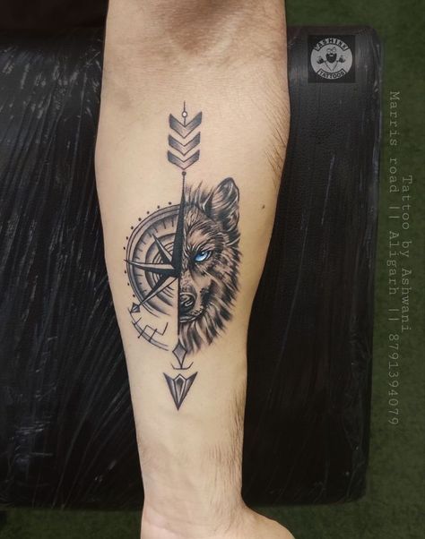 Wolf with compass tattoo Tatos Men Arm, Wolf With Compass Tattoo Design, Wolf Compass Tattoo Design, Meaningful Forearm Tattoo For Men, Wolf And Compass Tattoo, Lion And Compass Tattoo, Tattoo Ideas Boys, Underarm Tattoo For Men, Tattoo Ideas For Men Forearm Meaningful