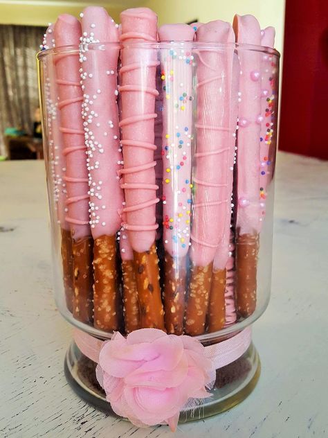 Candy Covered Pretzels Rods, Pink Chocolate Dipped Pretzels, Dipped Pretzel Rods Baby Shower, Pretzel Rods Dipped Valentines, Pink Dipped Pretzels, Pretzel Rods Dipped Birthday Parties, Pink Pretzel Rods, Baby Shower Pretzel Rods, Dipping Recipes