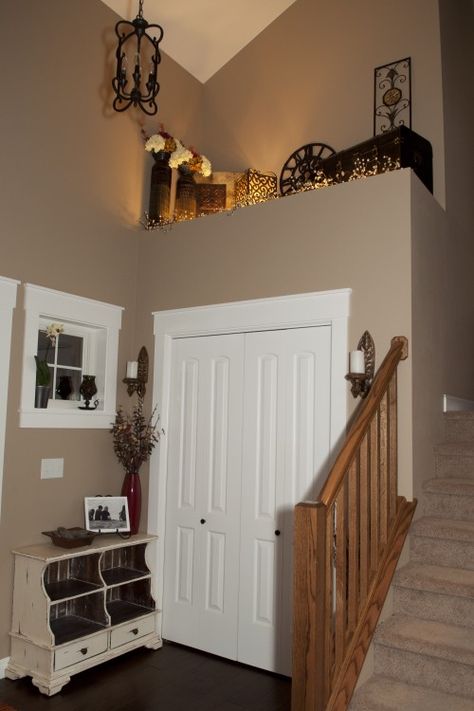 I need to do something on our ledge Split Level House Entry, High Shelf Decorating, Ceiling Makeover, Ledge Decor, House Entry, Cottagecore Kitchen, Ceiling Shelves, Entry Design, The Ledge