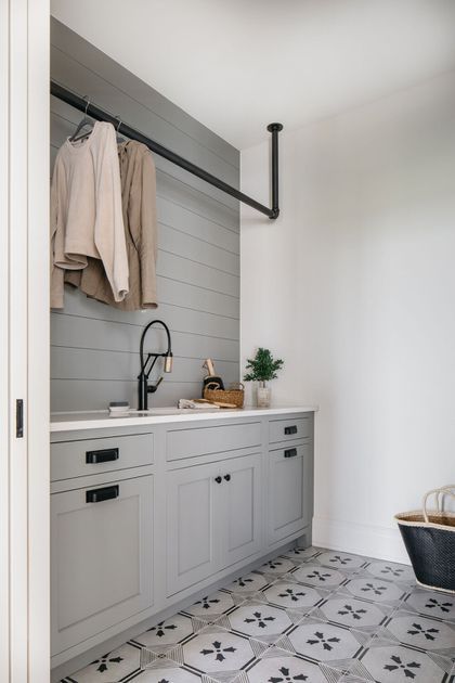 Big Laundry Room Ideas Basements, 12x12 Laundry Room Layout, Accent Wall In Laundry Room, Laundry Room Renovation Inspiration, Small Basement Laundry Room, Barndo Lighting, Long Laundry Room, Laundry Room Mud Room Combo, Laundry Room Color Ideas