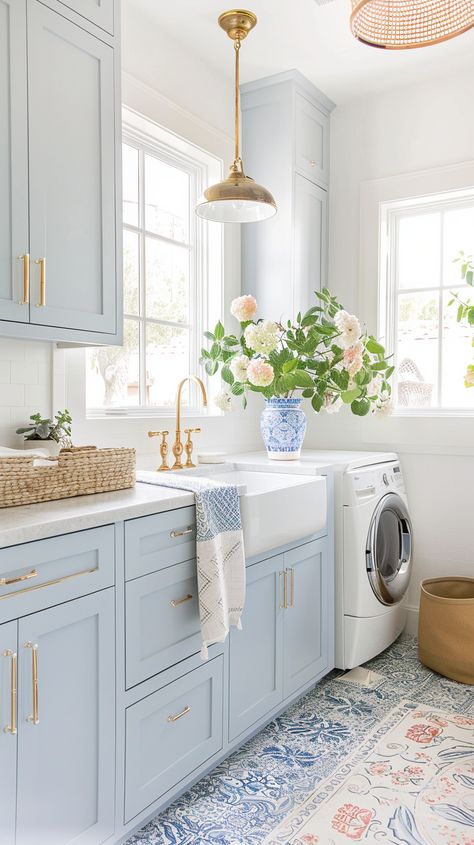 Elevate your laundry room from functional to fabulous with our curated collection of 44 elegant laundry room ideas that exude timeless style and sophistication. Dive into a world of chic design elements, luxurious finishes, and clever organizational solutions that will transform your laundry room into a space you'll love spending time in. Aqua Laundry Room Ideas, Preppy Laundry Room, Laundry Room Blue Cabinets, Blue And White Laundry Room, Light Blue Laundry Room, Coastal Laundry Room, Pink Laundry Room, Blue Laundry Room, Elegant Laundry Room