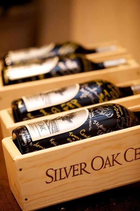 Instead of a guestbook, guests signed wine bottles to be opened on the couple's 1st, 5th, 15th, and 20th anniversaries...LOVE Silver Oak! Wine Bottle Guest Book, 20 Years Of Marriage, Guest Signing, Wine Signs, Wedding Book, Wine Bottles, Wedding Guest Book, California Wedding, Gatsby