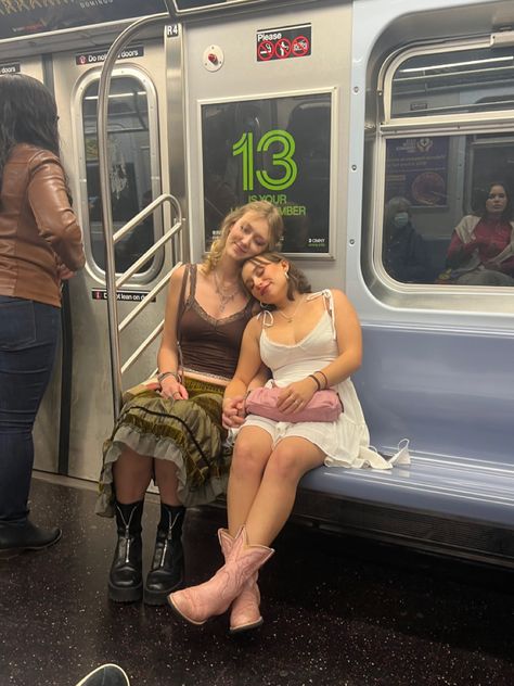 aesthetic bestfriend instagram pose, nyc, new york city, aesthetic subway picture, pink cowboy boot outfit ideas, fairy outfit, couple goals, lesbian lovers, gay Tall Girlfriend Short Girlfriend, Quad Poly Couple Aesthetic, Subway Couple Aesthetic, Lesbian Boots, Wlw Date Outfit, Fem Lesbian Outfit Ideas, Lesbian Date Outfit, Poly Couple Aesthetic, Lesbian Couple Aesthetic Outfits