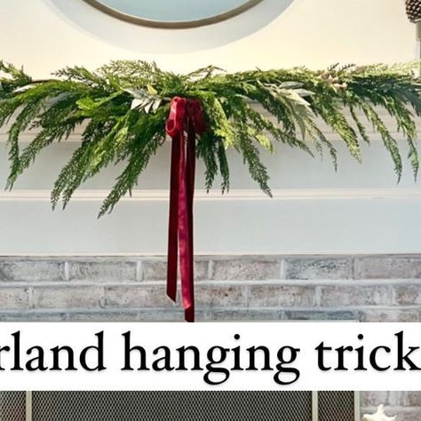 Kali on Instagram: "If you are feeling like you don’t have enough garland to achieve that “full” look on your mantle, try this trick: Instead of using command hooks and resting the garland on top of the mantle, try using cord bundles so you can drape the garland off the front of the mantle( giving it a much fuller look with less). Stick the command cord bundles at the edge of mantle and let the garland drape freely in front. It’s a great way to get a much fuller look without having to buy a ton of garland! Everything seen here is linked in my bio/stories including the command bundles I used to hang!" Garland On Mantle With Tv, Norfolk Pine Garland Mantle, How To Hang Garland, Hanging Garland On Mantle, Mantle With Tv, Garland On Mantle, How To Hang Garland On Mantel, Garland Hanger, Hide Cords