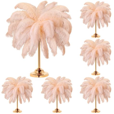 PRICES MAY VARY. Meet Using Needs: you will receive 80 pieces of ostrich feathers bulk in champagne color about 14-16 inches/ 35-40 cm, sufficient quantity and large size can meet your decorating and crafting needs in daily life Apply for: decorative feathers are nice for many occasions, such as themed weddings, table centerpieces, parties, cake tops, masquerade party decorations, family gatherings, festivals, photography, concerts, stages Natural Ostrich Feathers Adopted: feather trims are made Feather Party Decorations, Quinceñera Decoration Ideas, Pink And Gold Centerpieces, Tropical Wedding Table Decor, Project Runway Party, Table Decorations For Party, Masquerade Party Centerpieces, Centerpieces For Party, Decorative Feathers