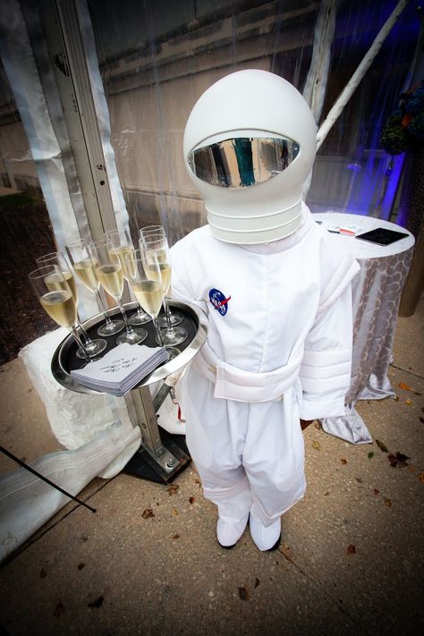 24 creative ways to throw a futuristic and space-themed party. Get inspired on PartySlate. #themedparty #themedpartyideas Nasa Themed Party, Space Themed Halloween Party, Elegant Space Theme Party, Sci Fi Party Ideas, Space Themed Event Decor, Intergalactic Party Theme, Future Party Theme Decor, Et Party Theme, Future Theme Event