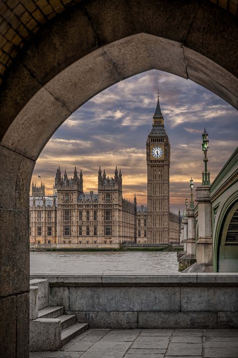 Story: As I stood on the banks of the Thames at sunset, gazing across the river at Big Ben and Westminster Bridge, I felt a sense of awe wash over me. The towering clock tower and the graceful span of the bridge were bathed in a warm golden light, and I knew I had to capture the moment with my camera. I quickly set up my tripod and began snapping photos, trying to capture the full beauty of the scene before me. The light was perfect, casting a warm glow over the buildings and the river. As I worked, I could feel the history of London coming alive around me. Big Ben and Westminster Bridge were symbols of the city's past and present, and I was humbled to be able to capture them at such a beautiful time of day. When the sun finally set and the sky was awash with orange and pink hues, I packed Britain Aesthetic, England Buildings, Elizabeth Tower, London Vibes, London Dreams, Westminster Bridge, London Baby, Big Ben London, London Aesthetic