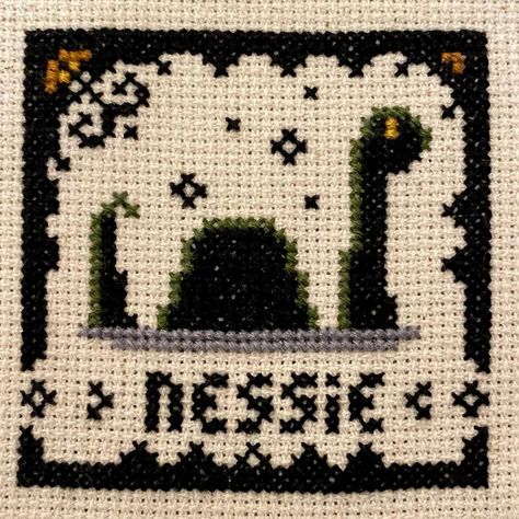 Tiffany Tzeng on Instagram: “#cryptidsal part 11: Nessie “The Loch Ness Monster, also known by the nickname Nessie, is said to inhabit Loch Ness in the Scottish…” Loch Ness Cross Stitch, Loch Ness Monster Craft, Crochet Nessie, Monster Craft, Unique Cross Stitch, Crochet Charts, Loch Ness Monster, Loch Ness, Monster Mash