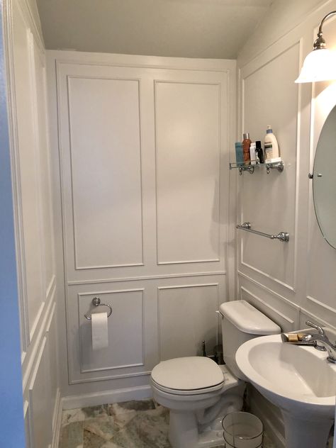 Small bathroom, big style with wall moulding DIY Millwork Wall Bathroom, Small Bathroom Molding Ideas, Bathroom Wall Moulding Ideas, Wall Molding Bathroom Half Baths, Picture Frame Moulding On Walls Bathroom, Box Molding Small Bathroom, Powder Bath Molding, Bathroom Box Molding, Powder Room With Molding