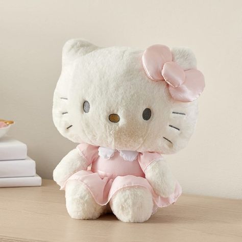 Bring joy to their holiday with this supercute Hello Kitty plush. With its soft faux fur and pink satin bow, this cuddly design is ready for hugs and companionship from playtime to bedtime. DETAILS THAT MATTER Made of 100% polyester with embroidered nose and mouth. Stuffed with polyester fiber. Doll outfit is made of 100% cotton with a satin bow. KEY PRODUCT POINTS Pottery Barn Kids exclusive. Suitable for all ages. Sold individually. Imported. (C) 2024 SANRIO CO., LTD.   Used Under License. Kitty Aesthetic, Hello Kitty Baby, Stuff Animals, Kitty Plush, Hello Kitty Pictures, Hello Kitty Plush, Bts Merch, Satin Bow, Consumer Products