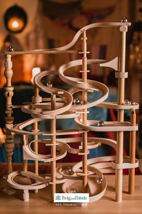 Build a fun marble run with these simple instructions. Perfect for creative minds and DIY enthusiasts. #MarbleRun #DIYProjects #Crafting #HomeFun #CreativeIdeas Marble Track Diy, Marble Run Ideas, Diy Marble Run, Wood Robots, Goldberg Machine, Marble Tracks, Marble Runs, Marble Machine, Diy Marble