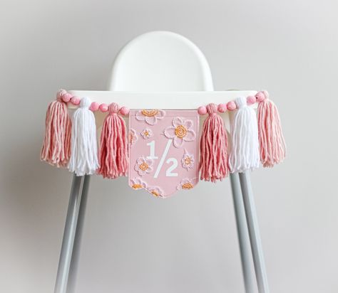 Pastel Birthday Party Decorations, Halfway To One, Pastel Birthday Party, Daisy Cake Topper, Yarn Tassel Garland, Baby Highchair, Half Birthday Party, Daisy Decorations, Daisy Cake