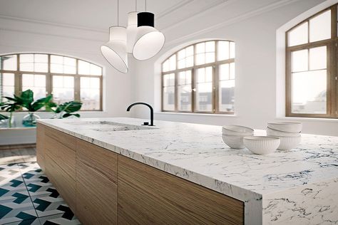 As should be obvious, White Attica quartz counter is really amazing when it’s everything joined even with dark-colored. This is another white kitchen with darker cabinets and multicolor floors and some wood making a shoreline style kitchen. #caesarstonewhiteatticakitchencountertops #caesarstonewhiteatticaquartzcountertops #caesarstonewhiteatticatops #caesarstonecolors #caesarstonetops #lightbrownislandcabinet #whiteatticamiteredge #whiteatticawaterfalledge #multicoloredfloor #whitequartzkitchens Quartz Kitchen Countertops White, Caesarstone Kitchen, Caesarstone Countertop, Quartz Kitchen Countertops, Quartz Kitchen, Popular Kitchens, White Quartz Countertop, Best Kitchen Designs, White Countertops