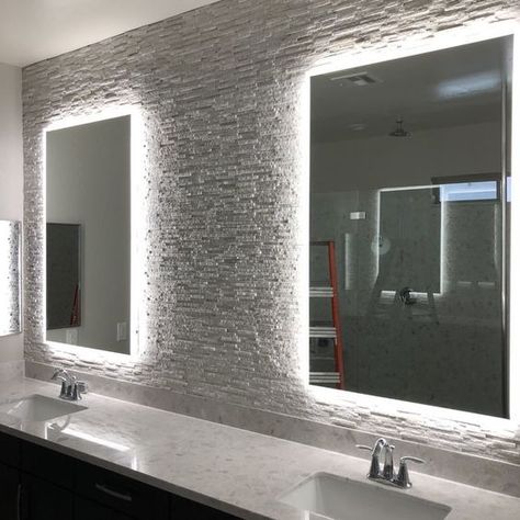 Back lit mirror on textured stone wall Lit Bathroom Mirror, Textured Stone Wall, Back Lit Mirror, Master Bath Lighting, Small Master Bath, Lit Mirror, Barber Shop Interior, Beach House Bathroom, Gym Mirrors