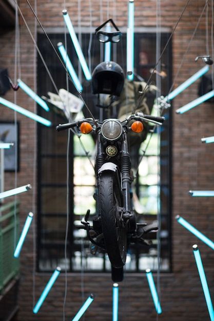 Motorcycle interior installation in pub | Free Photo #Freepik #freephoto #vintage #party #restaurant #blue Motorcycle Interior Design, Industrial Restaurant Design, Biker Photos, Pub Interior, Party Restaurant, Motorcycle Events, Electric Bike Battery, Industrial Restaurant, Enduro Motorcycle