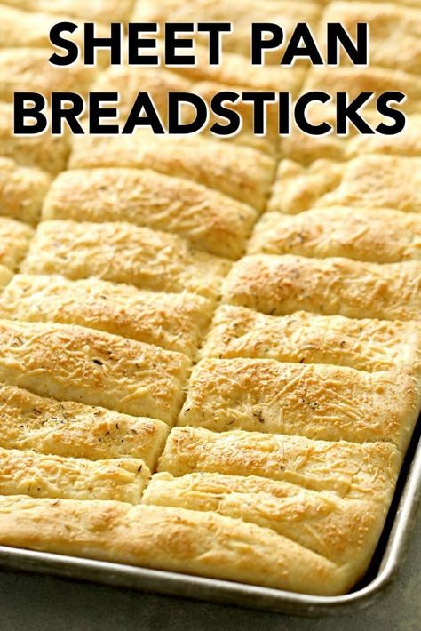 Sheet pan breadsticks from SixSistersStuff.com A huge pan of easy homemade breadsticks ready in less than 45 minutes! Top with your favorite herbs and seasonings to make these a family favorite. Easy Homemade Breadsticks, Garlic Breadsticks Recipe, Homemade Breadsticks, Breadsticks Recipe, Bread Sticks Recipe, Garlic Breadsticks, Six Sisters Stuff, Six Sisters, Recipe Sheets