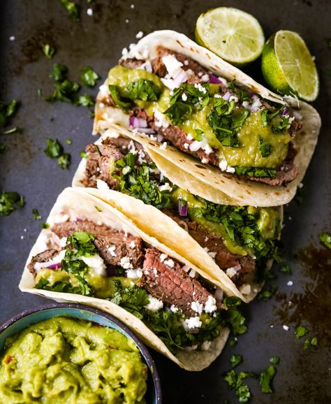 Grilled Steak Tacos. Juicy marinated grilled steak tacos with fresh cilantro, avocado, and salsa. The most flavorful and tender steak tacos recipe! www.modernhoney.com #tacos #steaktacos #steak #beeftacos Steak Taco Marinade, Grilled Steak Tacos, Steak Taco Recipe, Steak Taco, Mexican Steak, Asada Tacos, Carne Asada Tacos, Salsa Fresca, Tender Steak