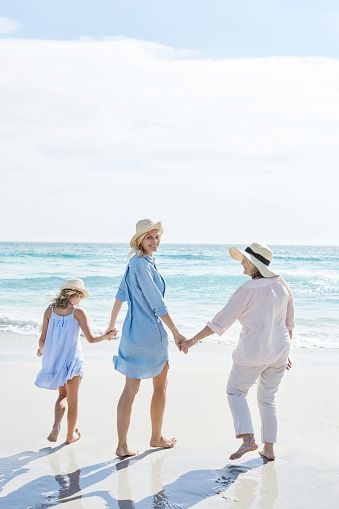 Mother, daughter and grandmother walking by the sea, rear view Grandmother Photography, Outfit Ideas For Family Pictures, Ideas For Family Pictures, Mother Daughter Granddaughter, Generations Photography, Daughter Photo Ideas, Father Daughter Tattoos, Grandma Photos, Mother Daughter Pictures