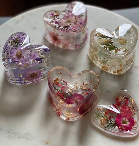 Colorful fresh pressed flowers encased in a crystal clear resin shaped box of your choice, with lid and embellished with sparkling foil.  Perfect for jewelry, keepsakes, desk and craft room organizing.  Inspired by my grandmothers painted porcelain dishes she had throughout her house for her jewelry's safe keeping while cooking and cleaning. As with most epoxy mediums, small imperfections and bubbles are an expected and often unavoidable part of the process and give each small batch poured item Craft Room Organizing, Art Boxes, Porcelain Dishes, Resin Box, Preschool Craft, Resin Crafts Tutorial, Bridal Party Favors, Heart Shape Box, Epoxy Resin Art