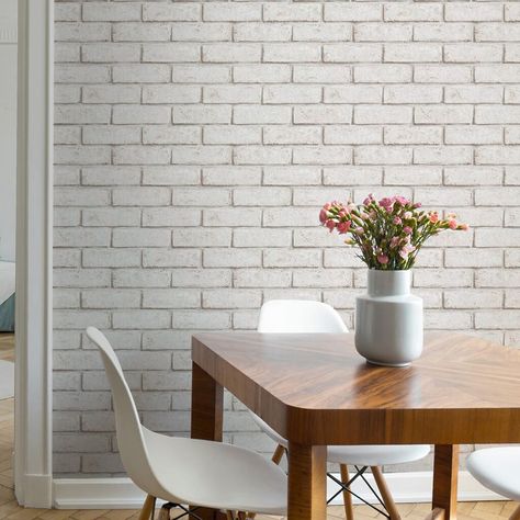 If you crave the industrial, tactile look of a bare brick wall without the mess and expense of stripping plaster, this brick wallpaper from Superfresco Easy is the perfect choice. With a combination of red brick with a white wash, this paper has been expertly designed to keep your room lights and bright, while still maintaining the warming effect of the red. Team with reclaimed timber and metal accessories to complete the look. Here at Wallpaper It we love all things wallpaper. Explore our range White Brick Wallpaper Kitchen, Brick Wallpaper Kitchen, White Red Wallpaper, Easy Wallpaper, Red Brick Wallpaper, Red And White Wallpaper, White Brick Wallpaper, Rustic Brick, Paintable Wallpaper