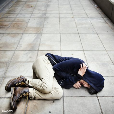 Guy in a hoodie fetal position on the floor | premium image by rawpixel.com Guy Sitting On Floor Reference, Person Curled Up On Floor, Man Sitting On The Floor Reference, Falling Asleep On Shoulder Reference, Scared Sitting Pose, Man Sitting On Ledge Reference, Crying On The Floor Reference, Cowering In Fear Pose, Drawing Subjects