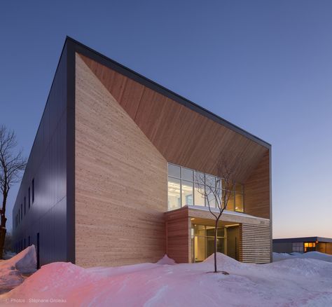 Image 3 of 12 from gallery of STGM Head Office  / STGM Architectes. Photograph by Stéphane Groleau Factory Architecture, Commercial And Office Architecture, Wooden Facade, Architectural Materials, Warehouse Design, Awesome Architecture, Office Pictures, Office Entrance, Entrance Design