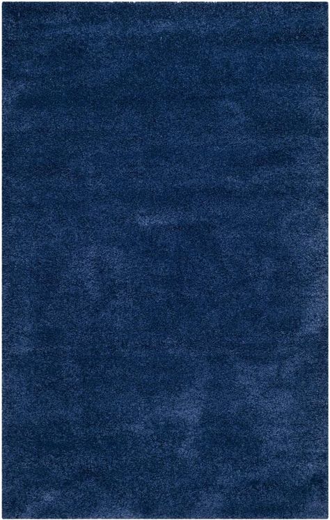 Construction: 100% Polypropylene. Full Dimensions: 4-ft x 6-ft. Pile Height: 1.81-in. Rug Weight: 19 lbs. Power Loomed. Made in Turkey. Rug Pad Recommended. Vacuum regularly, spot clean with mild detergent, professionally dry clean. 30 Day Limited Warranty. Safavieh Milan Shag 4 x 6 Navy Indoor Solid Area Rug in Blue | SG180-7070-4 European Aesthetic, Safavieh Rug, Solid Area Rugs, Blue Texture, Rug Texture, Fabric Textures, Navy Rug, Navy Area Rug, Rugs Size