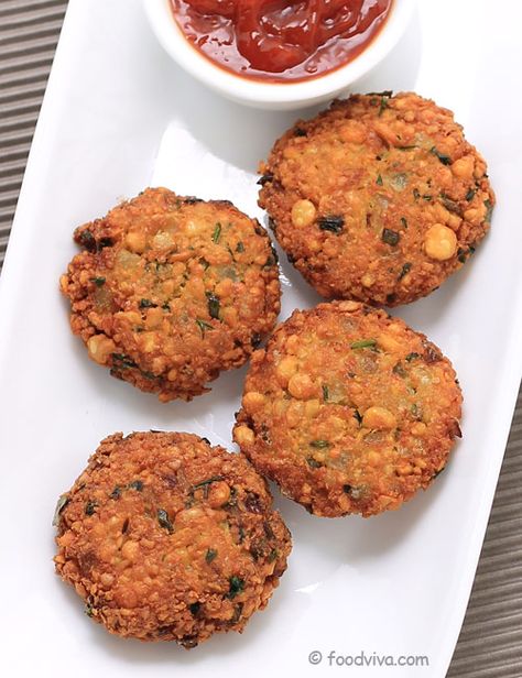 If you are craving for something crispy and crunchy, then make this Masala Vada with Chana Dal and your taste buds will not stop thanking us. With its unique texture of crisp crust and soft inner combined with delicious taste and aroma of carefully blended spices, this Paruppu Vadai Recipe is one of the best snack recipes. Shower Food Ideas Appetizers, Food Ideas Appetizers, Masala Vada, Baby Shower Food Ideas, Shower Food Ideas, Desi Street Food, Vada Recipe, Chana Dal, Pani Puri