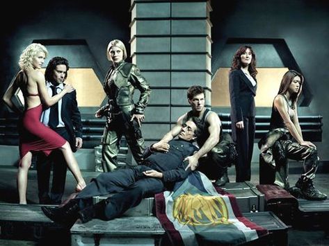 50 Best Sci-Fi Shows | Science Fiction TV Shows Battlestar Galactica Cast, Best Sci Fi Shows, Jamie Bamber, Sci Fi Tv Shows, Sneak Attack, Sci Fi Shows, Sci Fi Tv, Battle Star, Sci Fi Series