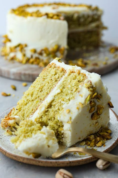 This light and airy Pistachio Cake is made from scratch, full of real pistachios, and topped with a delicious buttercream frosting. It's a classy cake that will impress your guests on any occasion! Vanilla Pistachio Cake, Sicilian Pistachio Cake Recipe, Pistachio Butter Cake, Pistachio Cake From Scratch, Best Pistachio Cake Recipe, Pistachio Almond Cake, Pistachio Cake Pops, Pistachio Cream Cheese Frosting, Pistachio Layer Cake