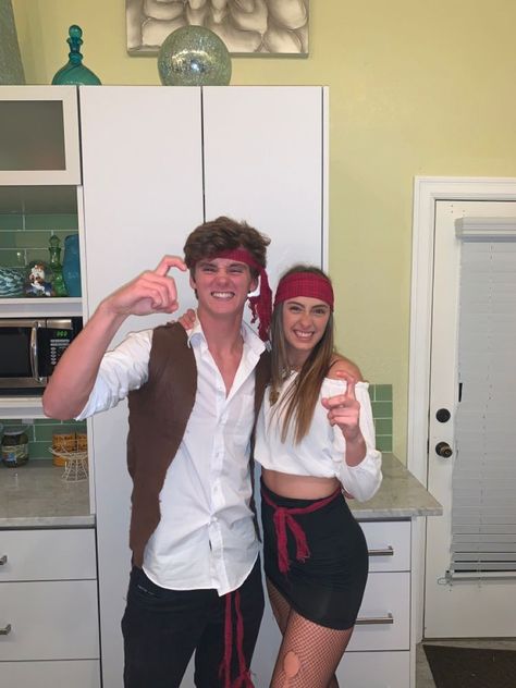 Dressing up with your partner for Halloween this year will be a blast! Imagine the fun of wearing matching costumes and embracing the holiday spirit together. It's a great way to bond and create memories. Get ready for a spooktacular time! Pirates Halloween Costumes Couples, Pirates Couples Costume, Disfraces Goals Novios Halloween, Couples Costumes Pirate, Couples Pirate Costume Halloween, Pirate Couple Halloween Costumes, Couple Halloween Costumes Pirates, Guy Pirate Costume, Couple Pirate Costume Halloween